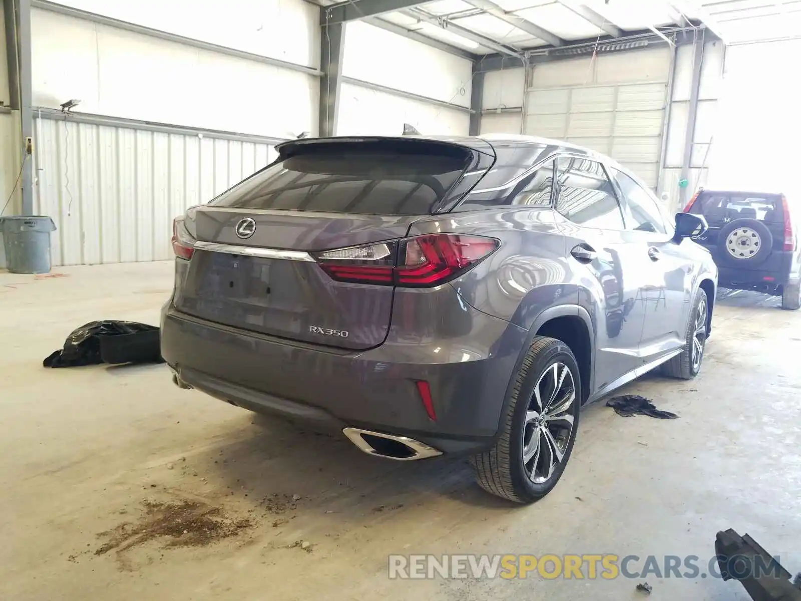 4 Photograph of a damaged car 2T2ZZMCA6KC123119 LEXUS RX 350 BAS 2019