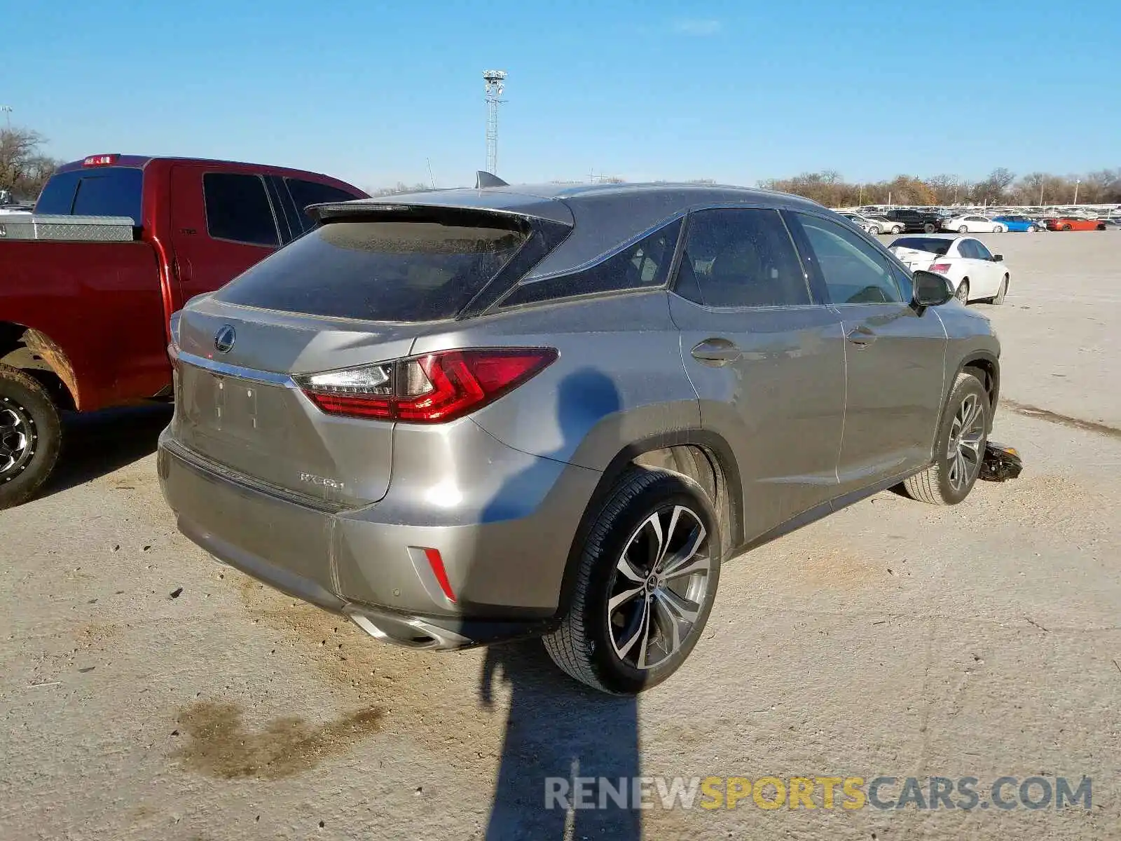 4 Photograph of a damaged car 2T2ZZMCA8KC118598 LEXUS RX 350 BAS 2019