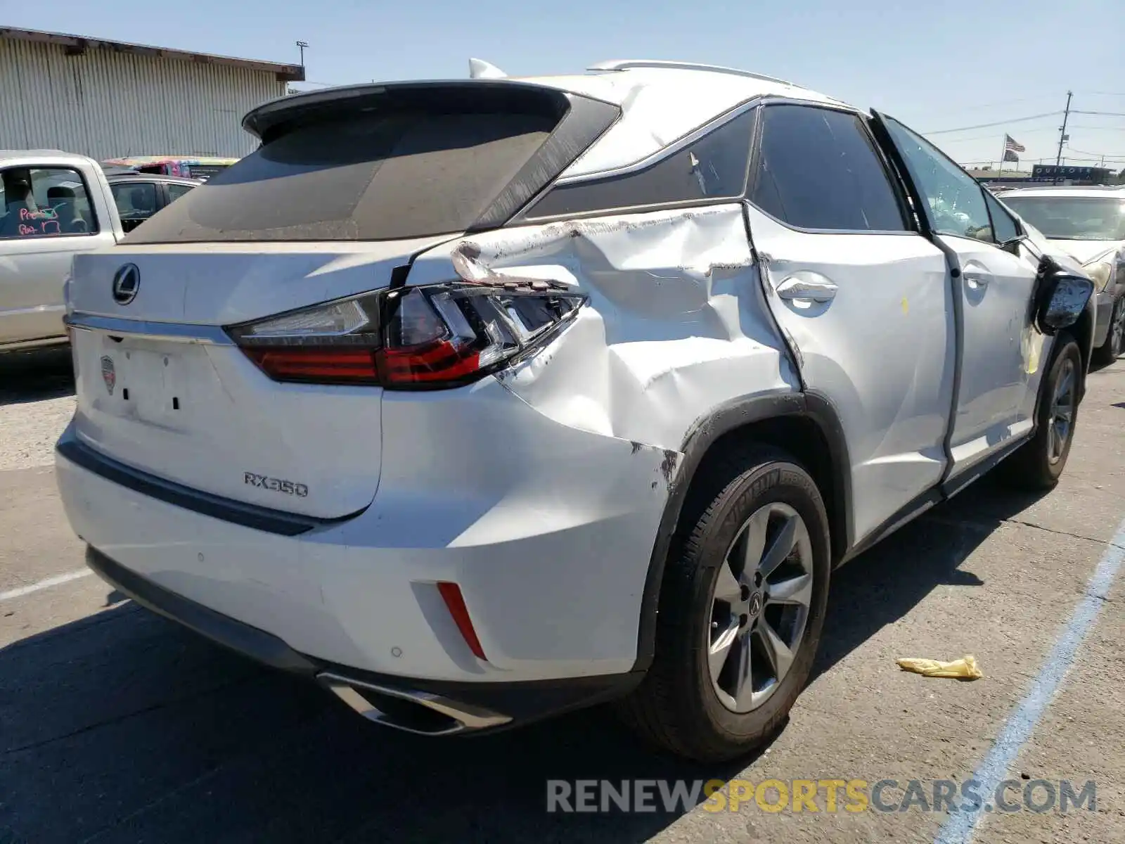 4 Photograph of a damaged car 2T2ZZMCA8KC136129 LEXUS RX 350 BAS 2019