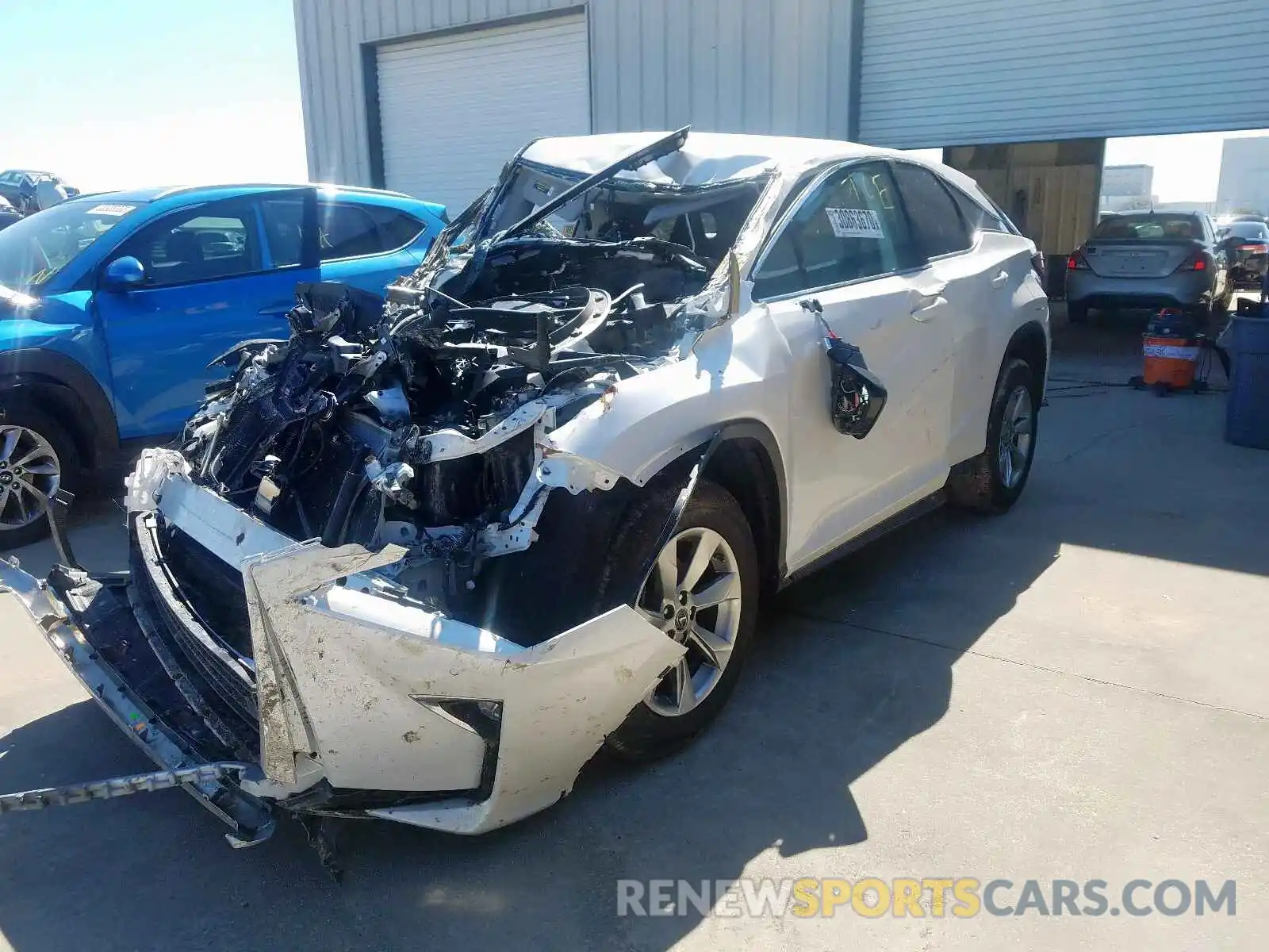 2 Photograph of a damaged car 2T2ZZMCA9KC125494 LEXUS RX 350 BAS 2019