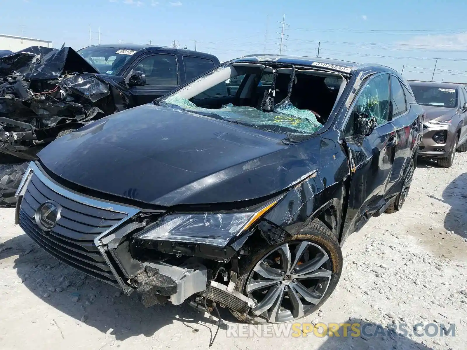 2 Photograph of a damaged car 2T2ZZMCA9KC127312 LEXUS RX 350 BAS 2019