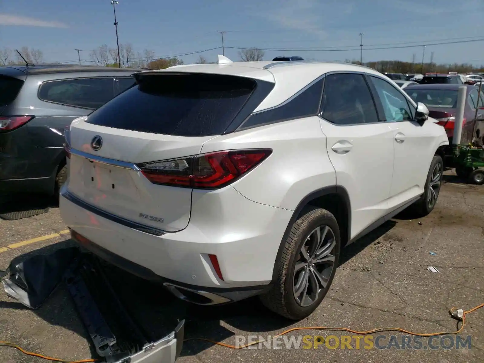 4 Photograph of a damaged car 2T2BZMCA1KC201033 LEXUS RX350 2019