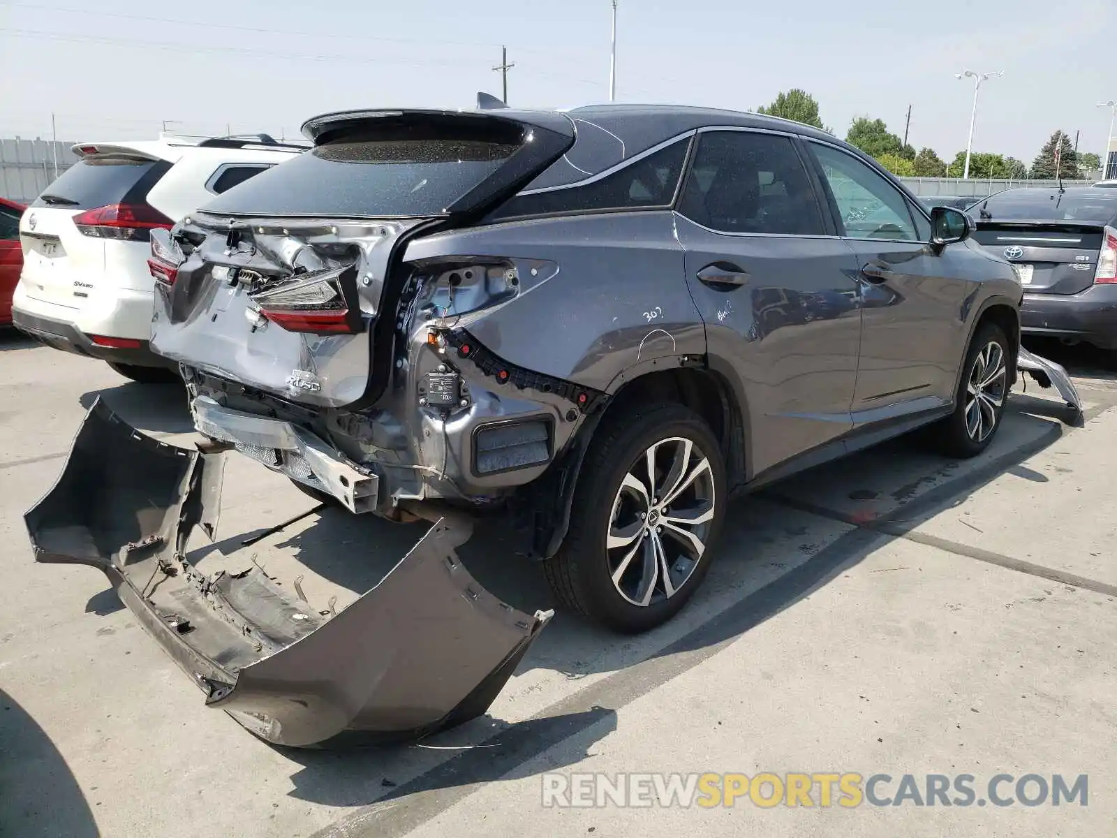 4 Photograph of a damaged car 2T2BZMCA2KC199048 LEXUS RX350 2019