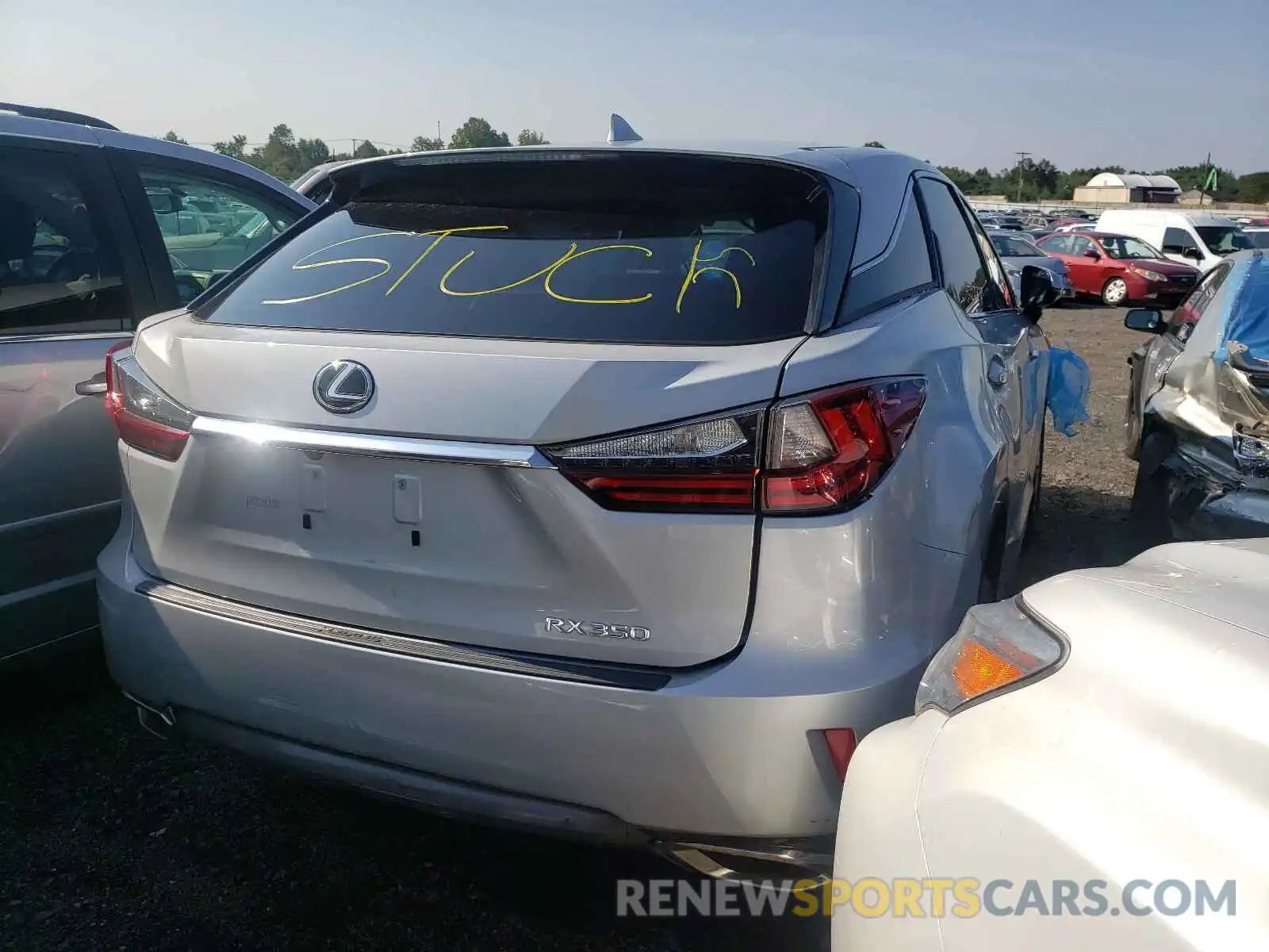 4 Photograph of a damaged car 2T2BZMCA2KC210341 LEXUS RX350 2019