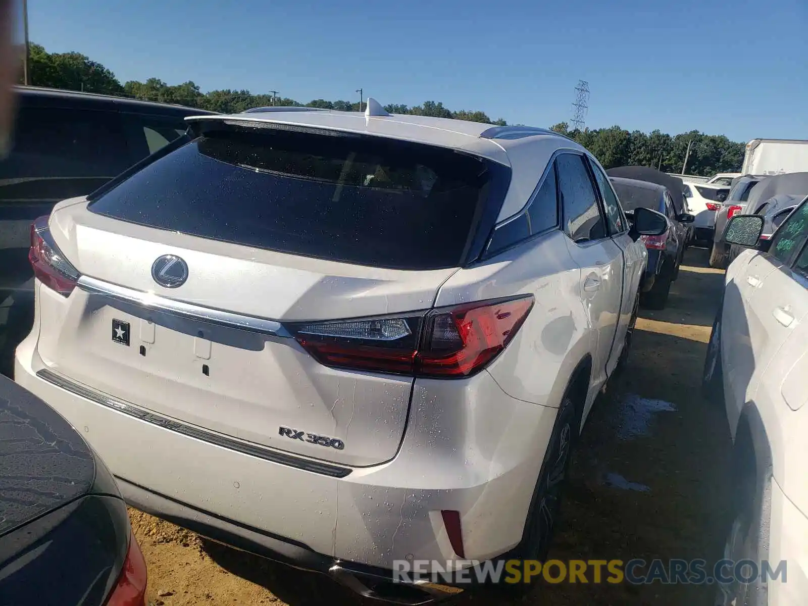 4 Photograph of a damaged car 2T2BZMCA3KC200367 LEXUS RX350 2019