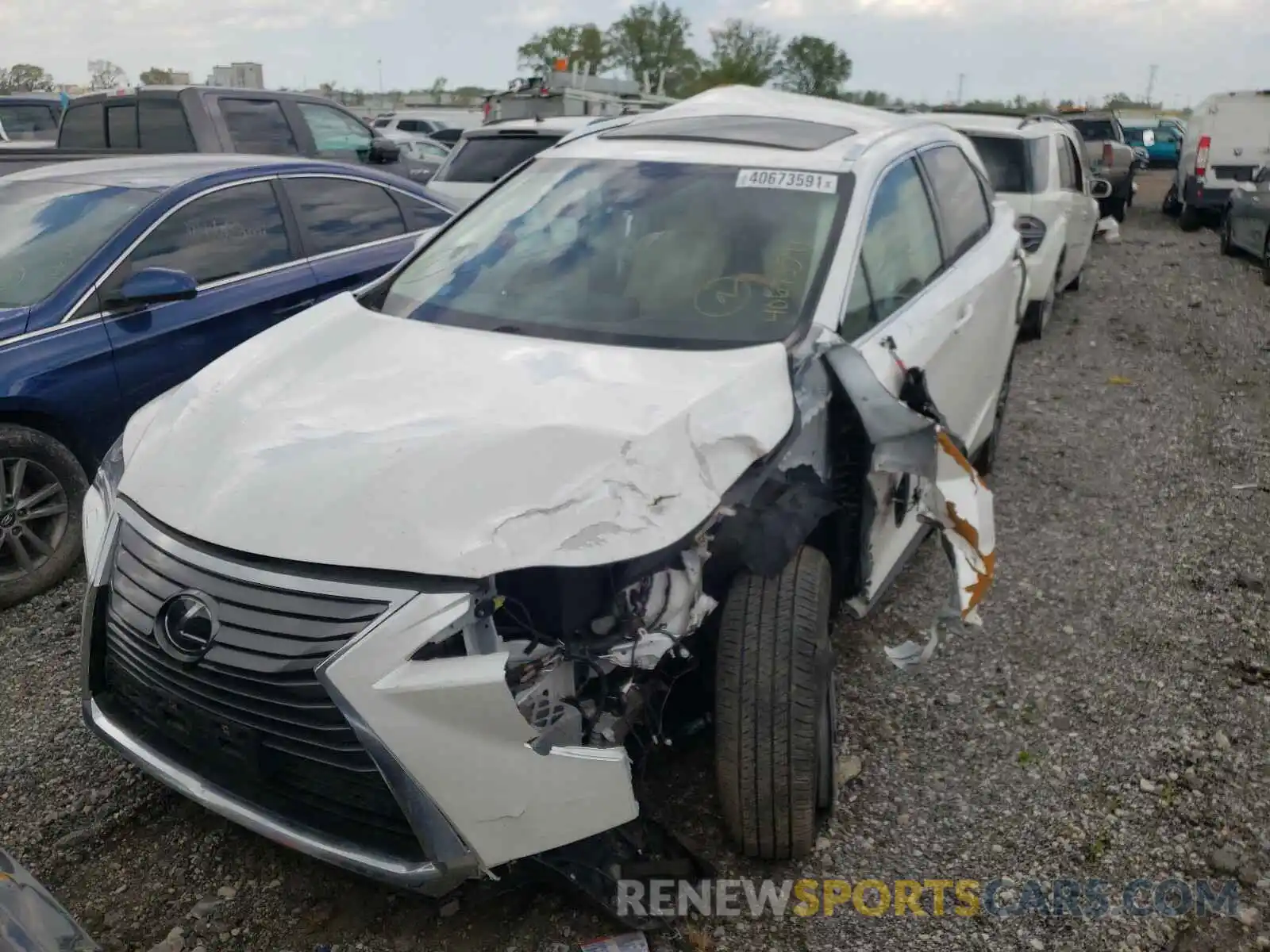 2 Photograph of a damaged car 2T2BZMCA3KC210462 LEXUS RX350 2019