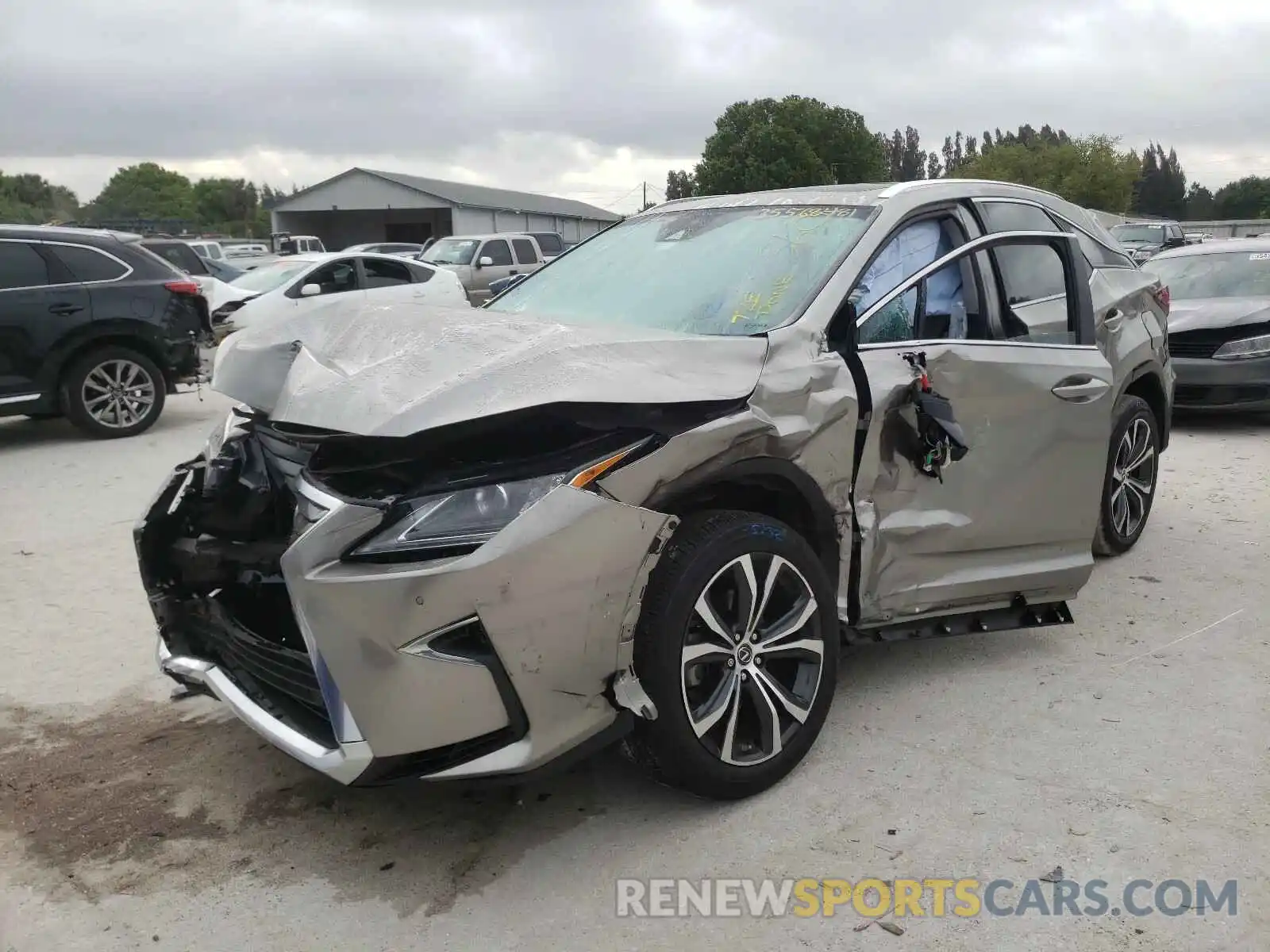 2 Photograph of a damaged car 2T2BZMCA6KC207331 LEXUS RX350 2019