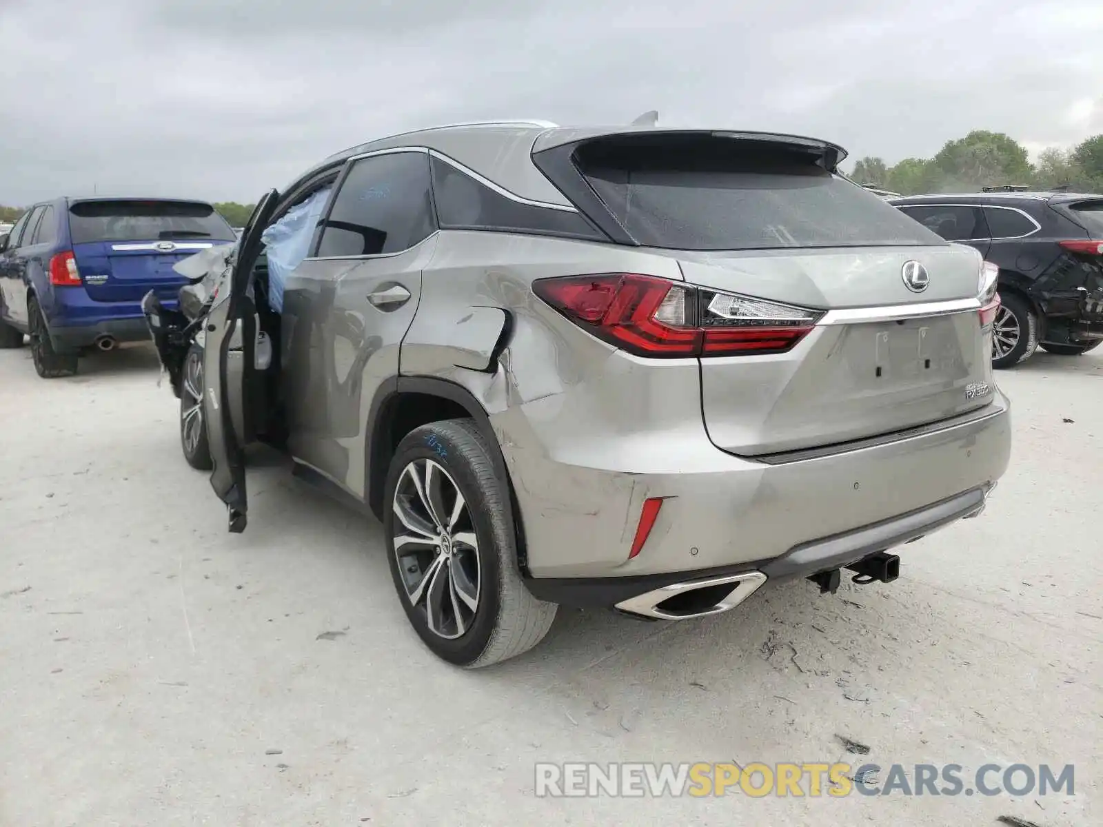 3 Photograph of a damaged car 2T2BZMCA6KC207331 LEXUS RX350 2019