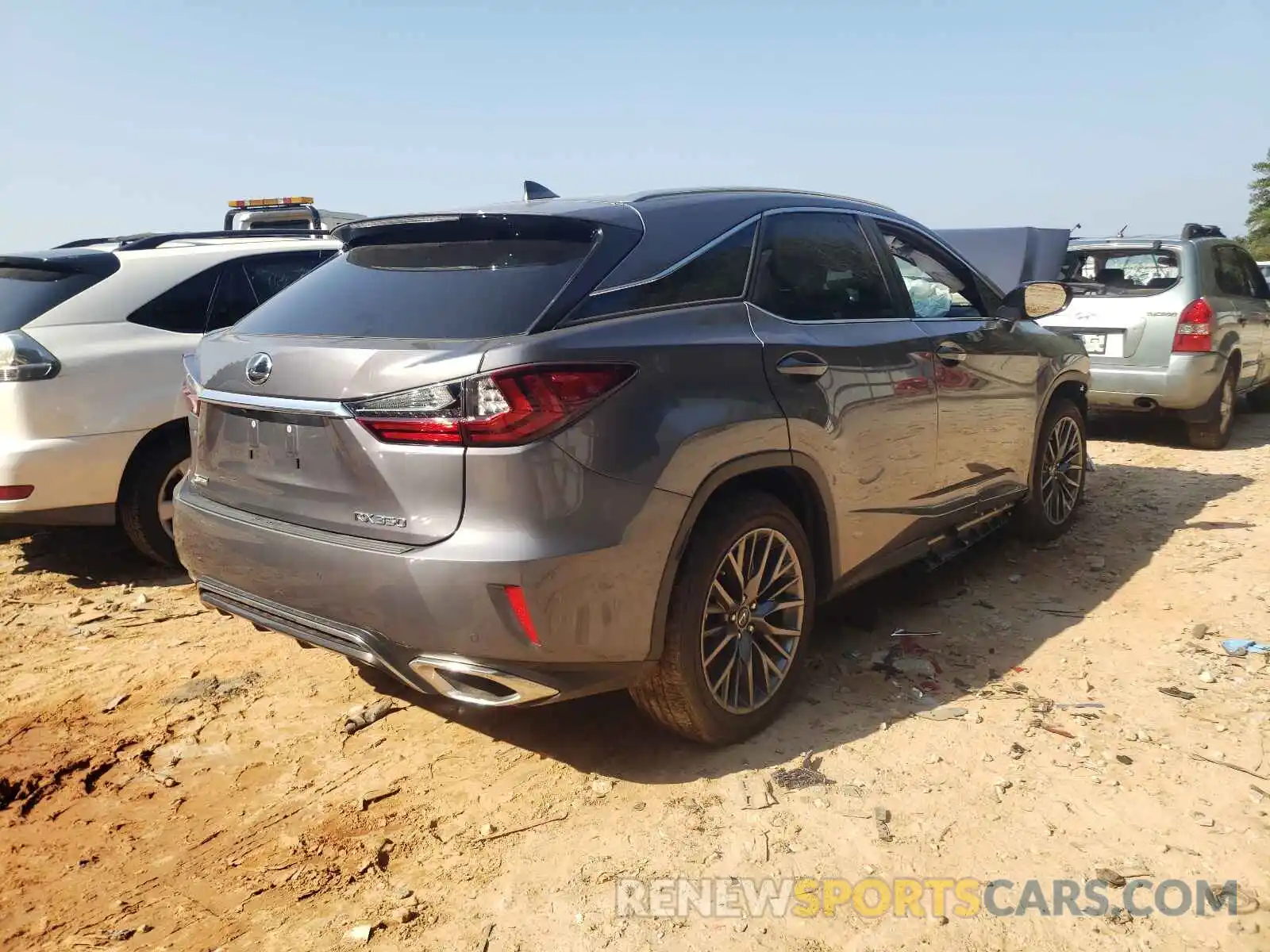 4 Photograph of a damaged car 2T2BZMCA7KC179295 LEXUS RX350 2019