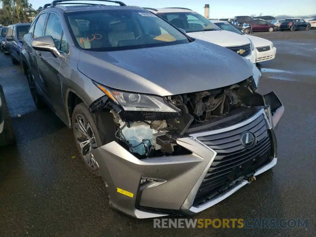 1 Photograph of a damaged car 2T2BZMCA8KC169679 LEXUS RX350 2019