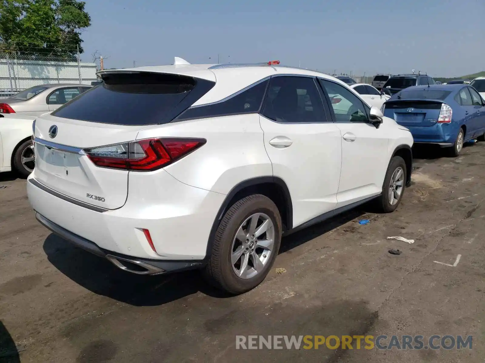 4 Photograph of a damaged car 2T2BZMCA8KC200638 LEXUS RX350 2019