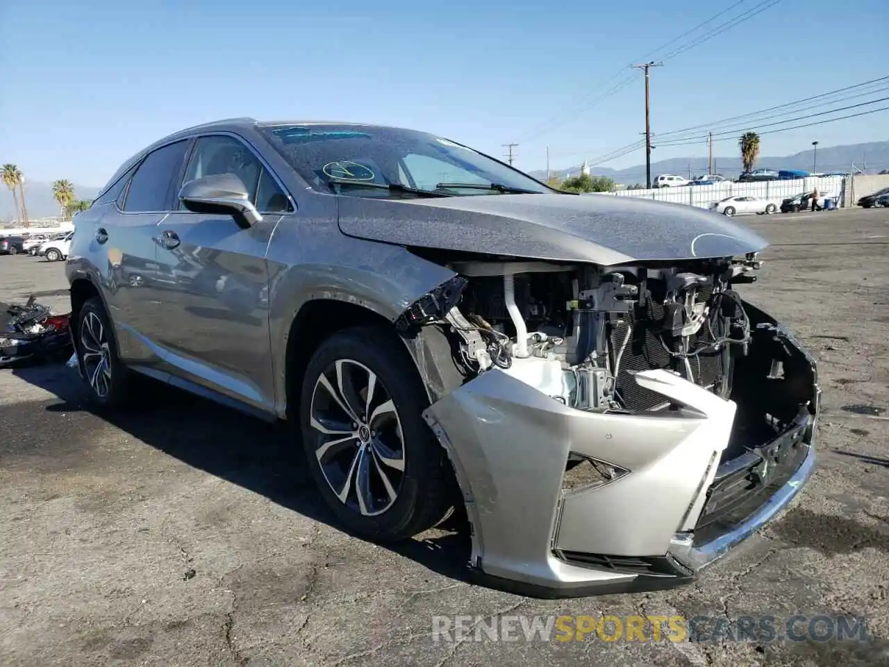 1 Photograph of a damaged car 2T2BZMCAXKC170851 LEXUS RX350 2019