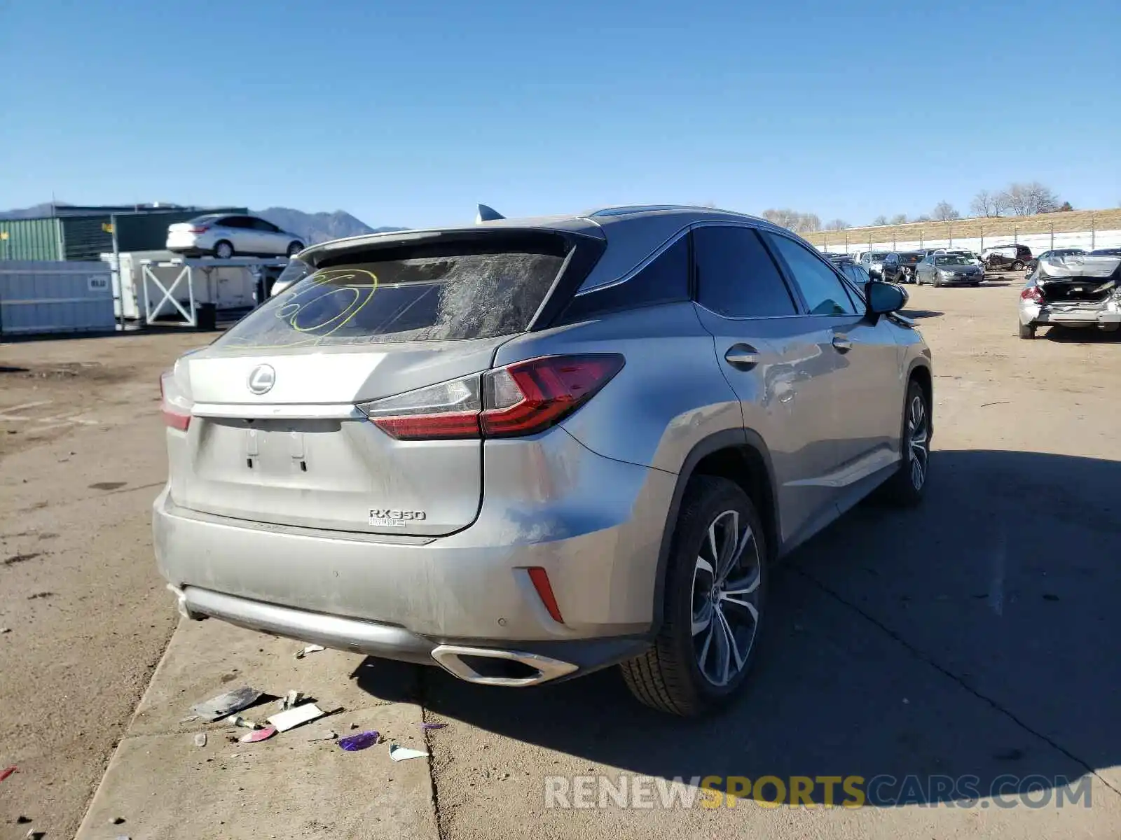 4 Photograph of a damaged car 2T2BZMCAXKC203721 LEXUS RX350 2019