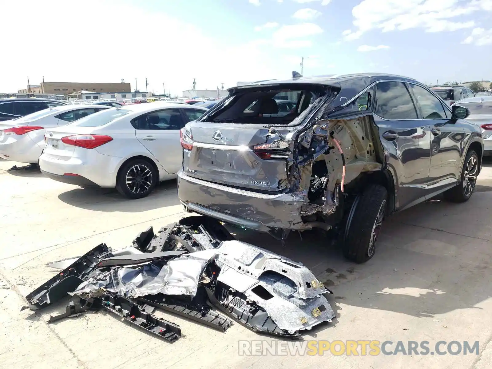 4 Photograph of a damaged car 2T2ZZMCA2KC117494 LEXUS RX350 2019