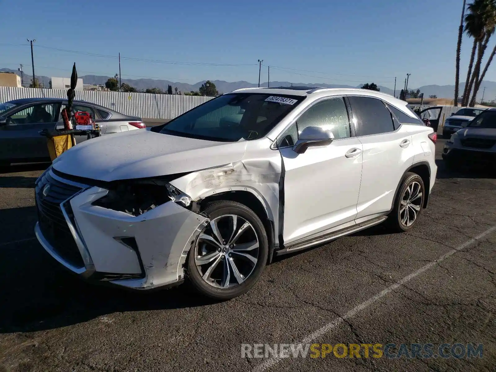 2 Photograph of a damaged car 2T2ZZMCA3KC119738 LEXUS RX350 2019