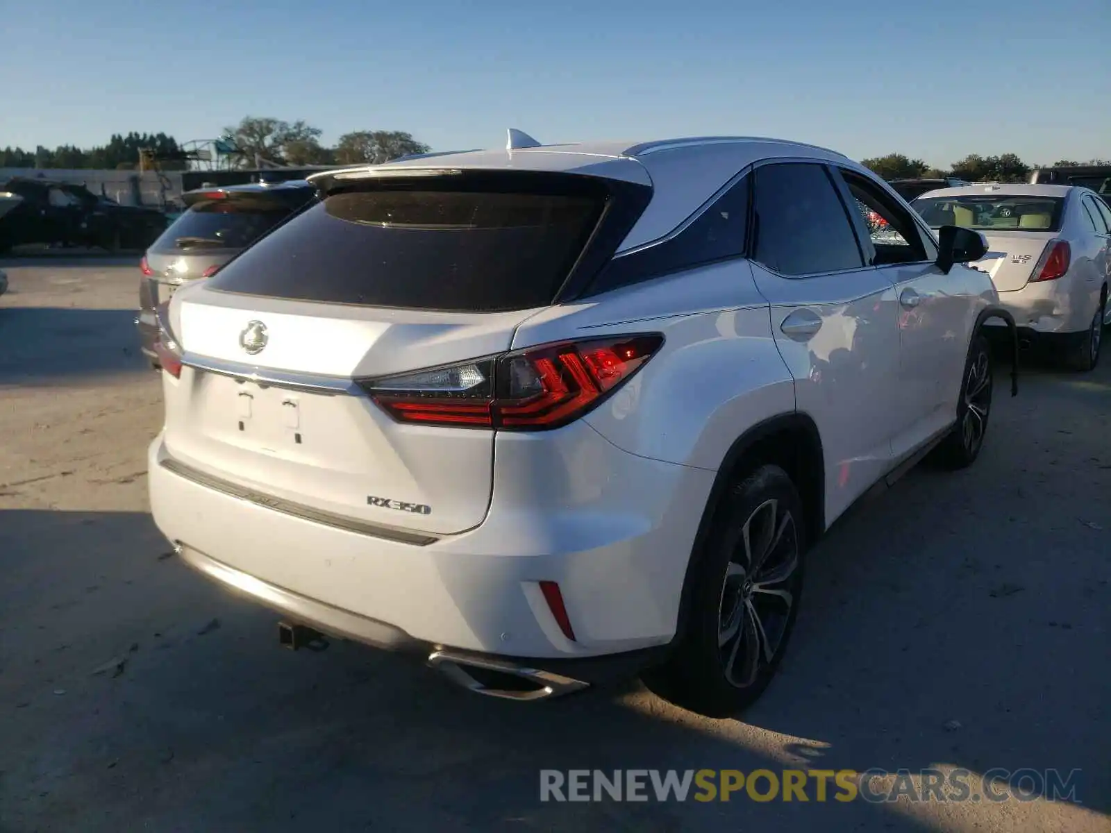 4 Photograph of a damaged car 2T2ZZMCA4KC121384 LEXUS RX350 2019