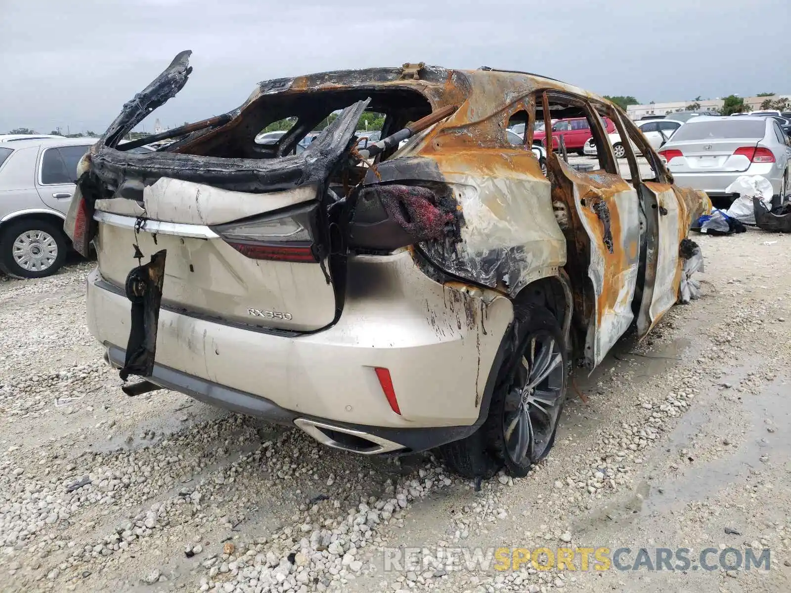 4 Photograph of a damaged car 2T2ZZMCA5KC133169 LEXUS RX350 2019