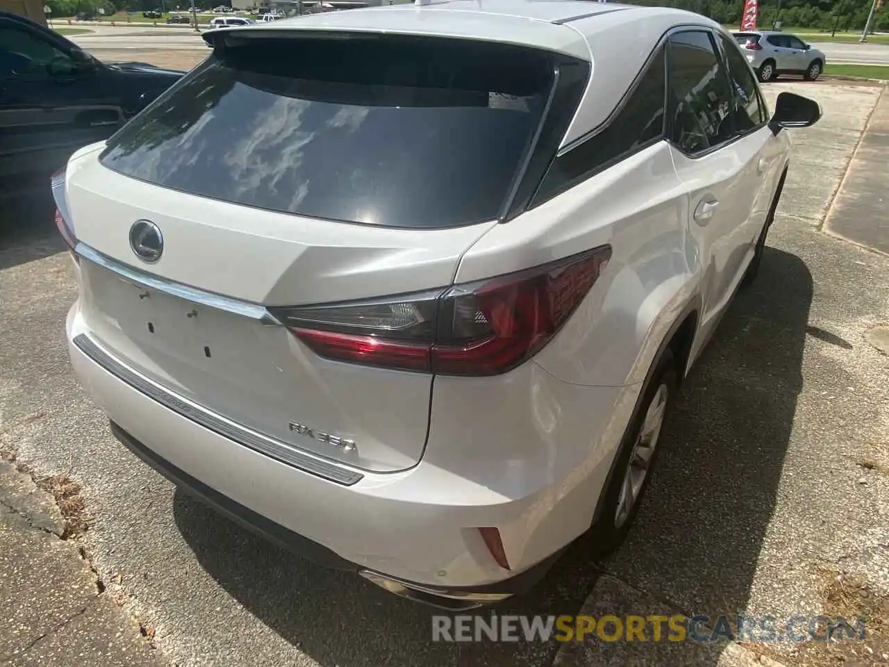 4 Photograph of a damaged car 2T2ZZMCA6KC126523 LEXUS RX350 2019