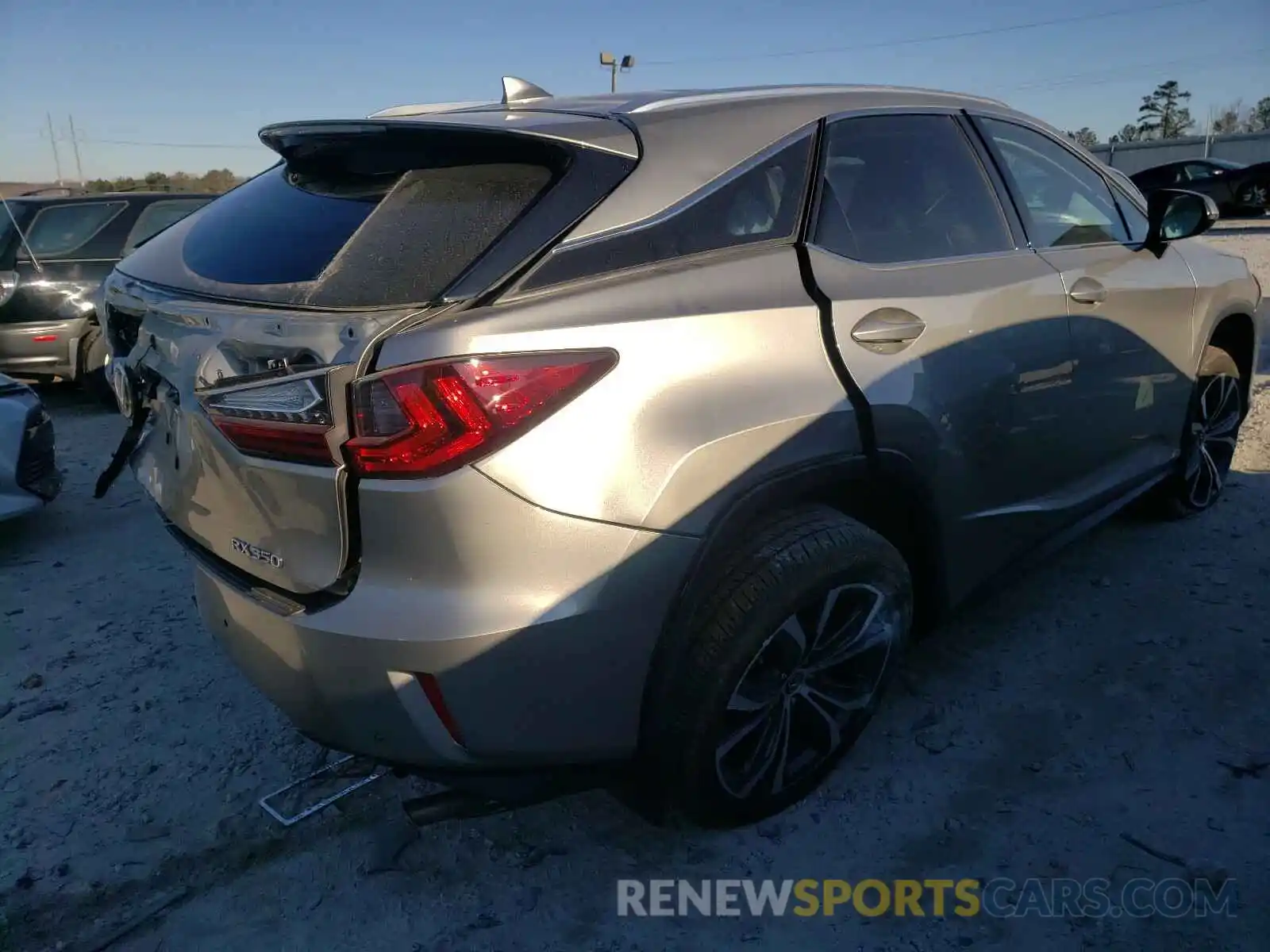 4 Photograph of a damaged car 2T2ZZMCA6KC142477 LEXUS RX350 2019