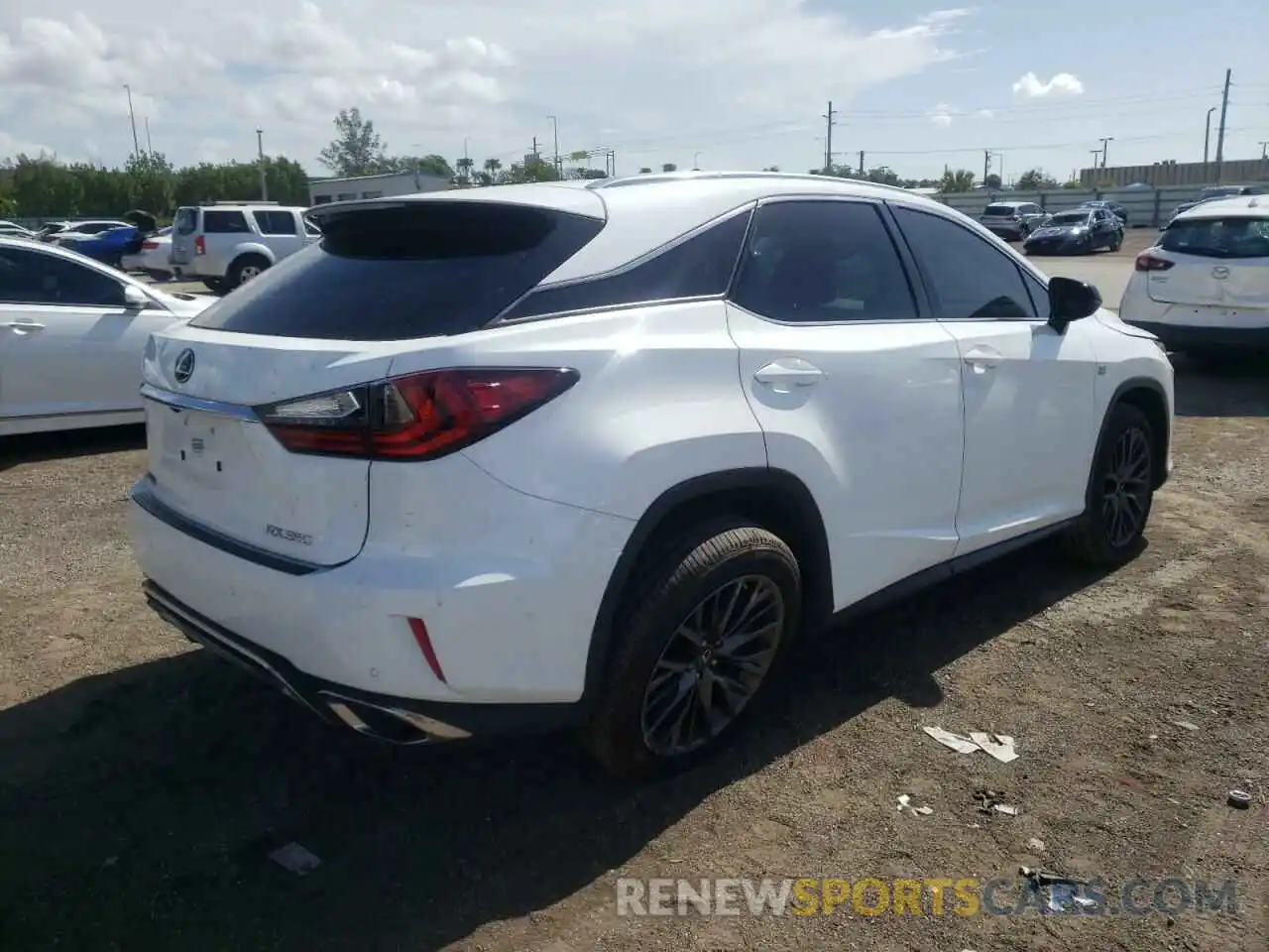 4 Photograph of a damaged car 2T2ZZMCA6KC143984 LEXUS RX350 2019