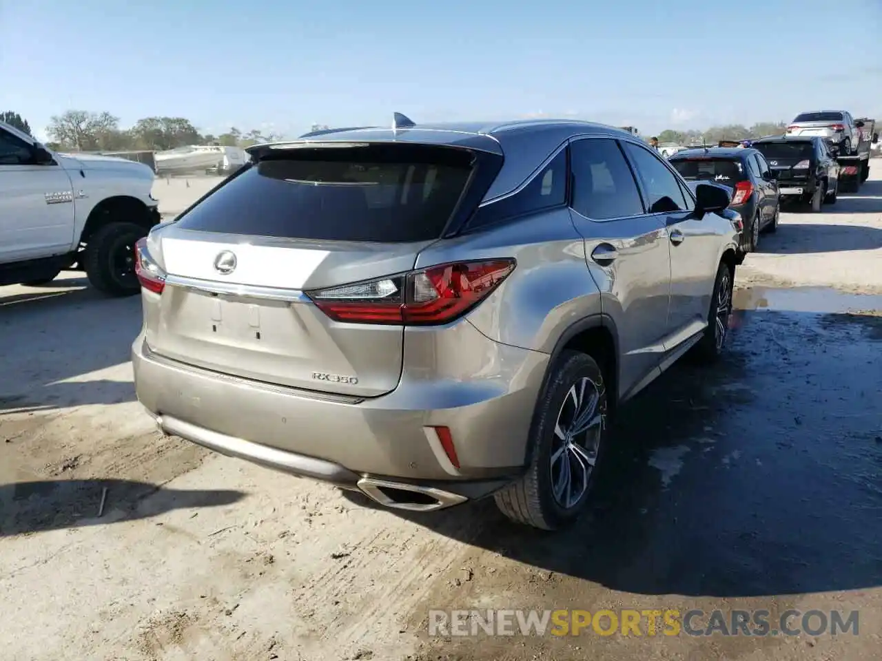 4 Photograph of a damaged car 2T2ZZMCA7KC128863 LEXUS RX350 2019