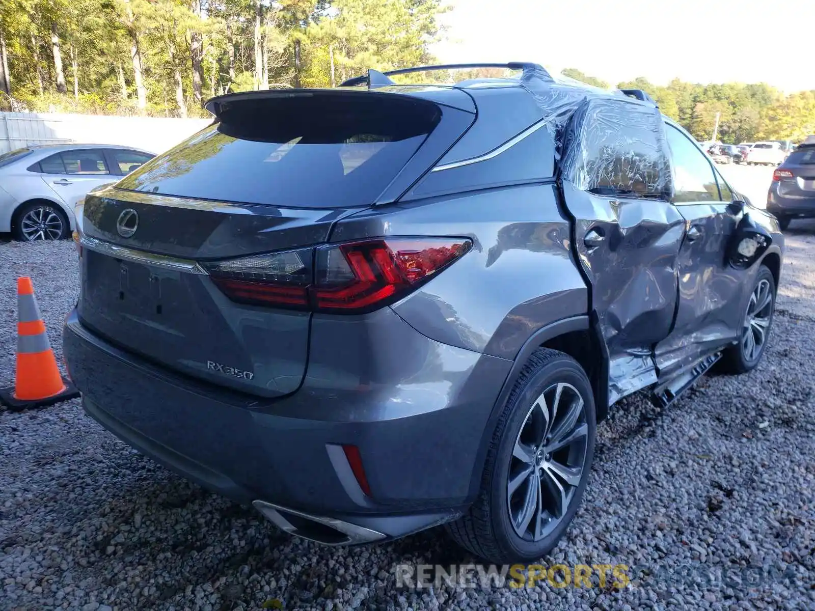 4 Photograph of a damaged car 2T2ZZMCA7KC134520 LEXUS RX350 2019