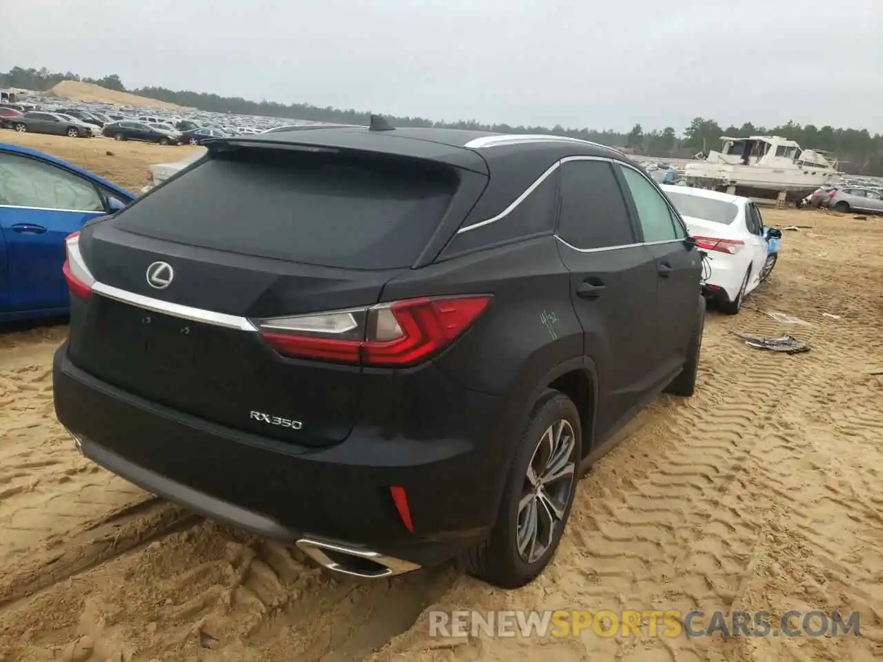 4 Photograph of a damaged car 2T2ZZMCA7KC142682 LEXUS RX350 2019