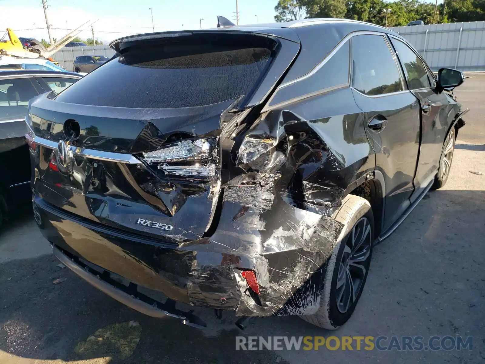 4 Photograph of a damaged car 2T2ZZMCA7KC145517 LEXUS RX350 2019