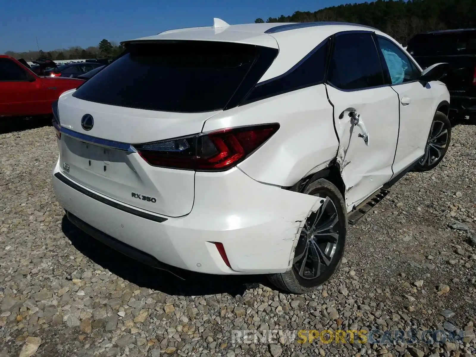 4 Photograph of a damaged car 2T2ZZMCA8KC139595 LEXUS RX350 2019
