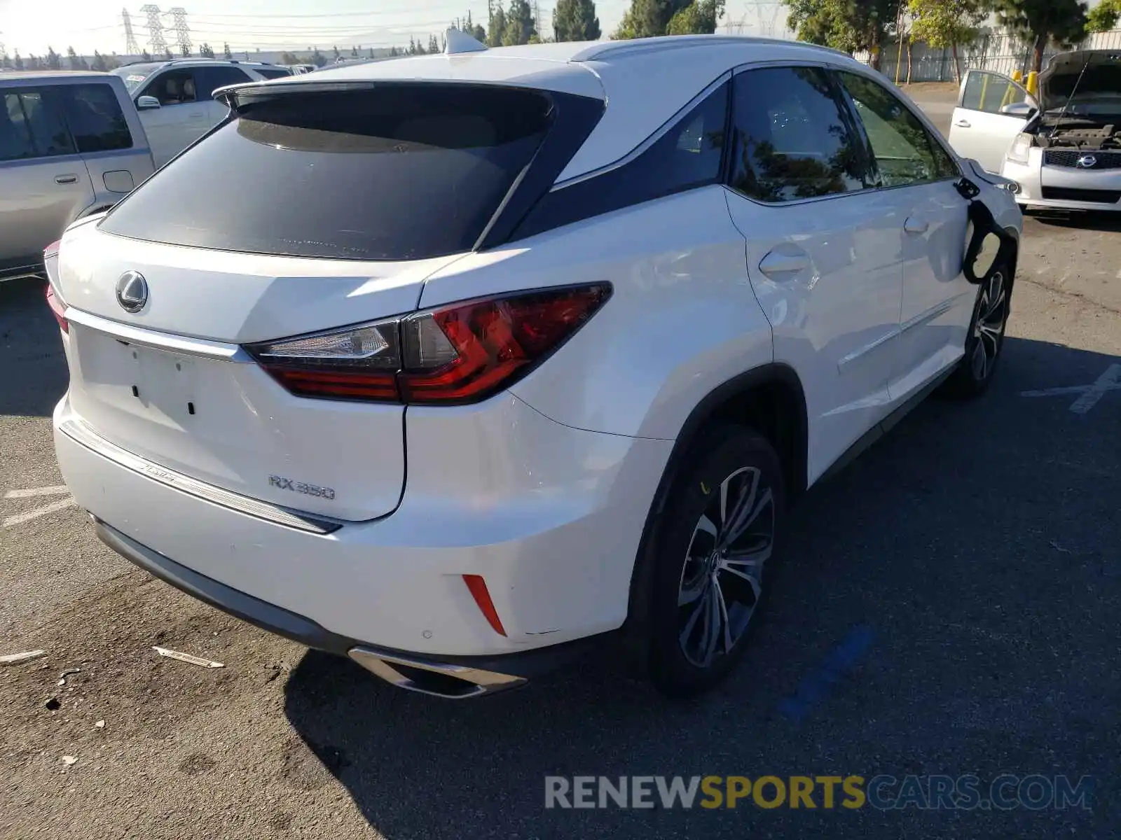 4 Photograph of a damaged car 2T2ZZMCA8KC143016 LEXUS RX350 2019