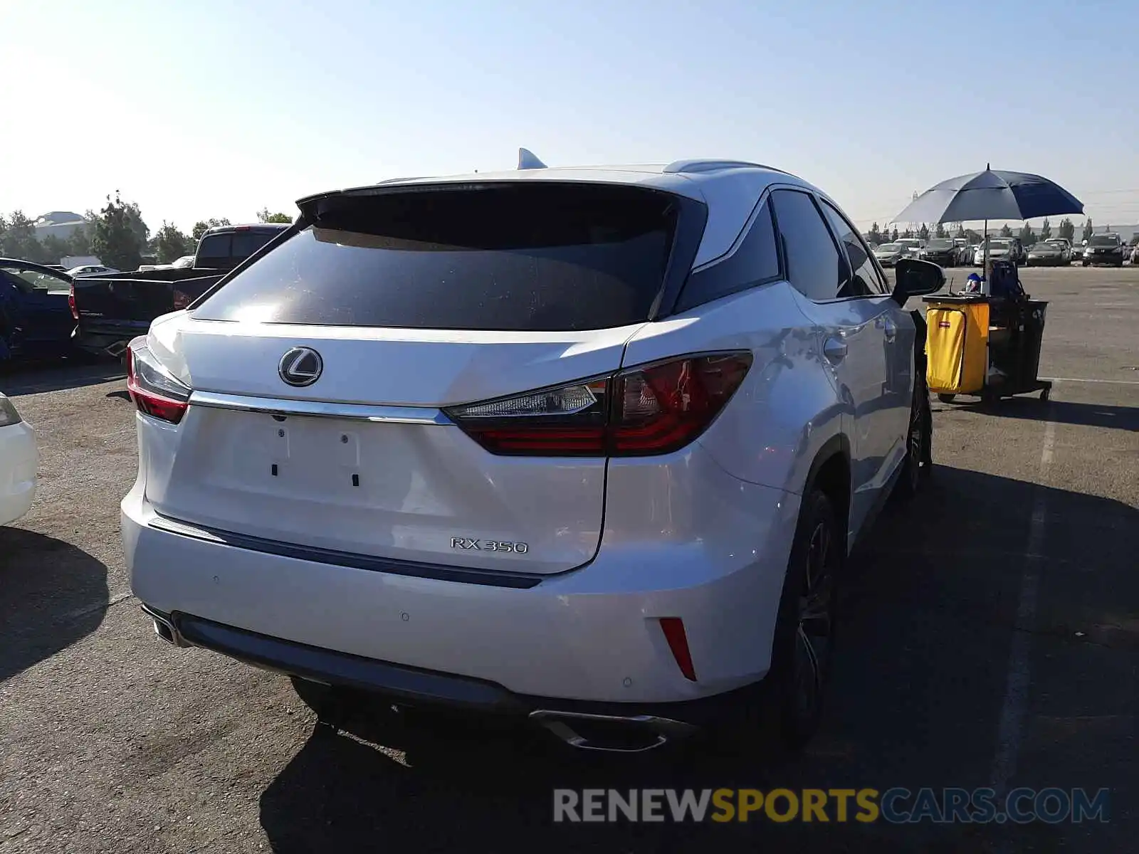 4 Photograph of a damaged car 2T2ZZMCA9KC123549 LEXUS RX350 2019