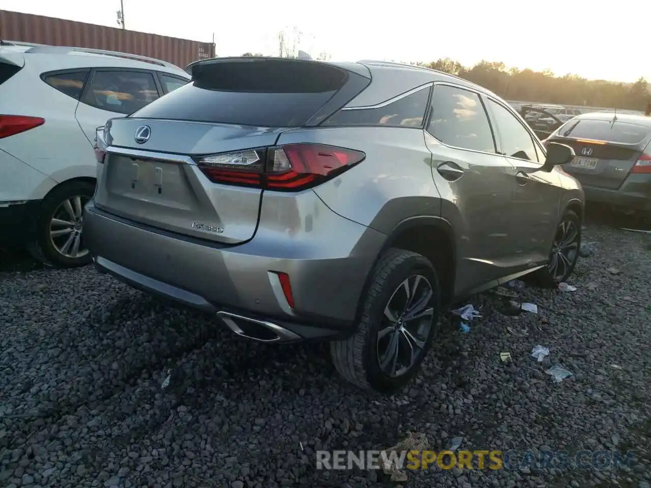 4 Photograph of a damaged car 2T2ZZMCA9KC128413 LEXUS RX350 2019