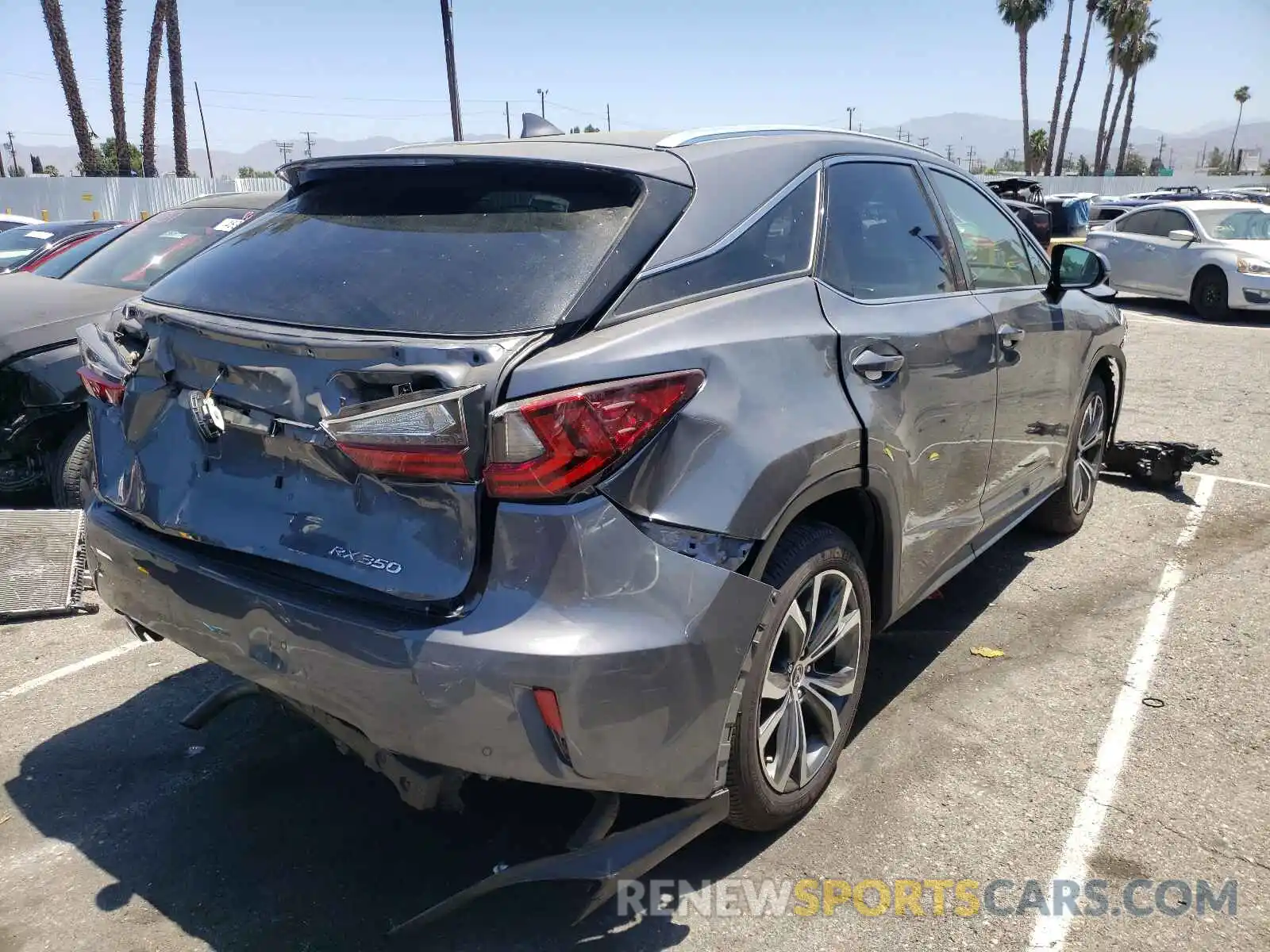 4 Photograph of a damaged car 2T2ZZMCA9KC150928 LEXUS RX350 2019