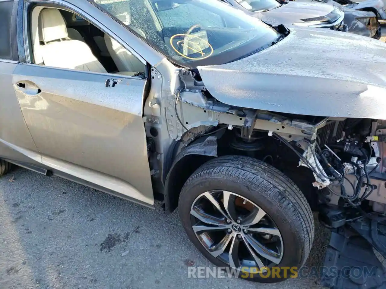 10 Photograph of a damaged car 2T2HZMAA0LC164247 LEXUS RX350 2020