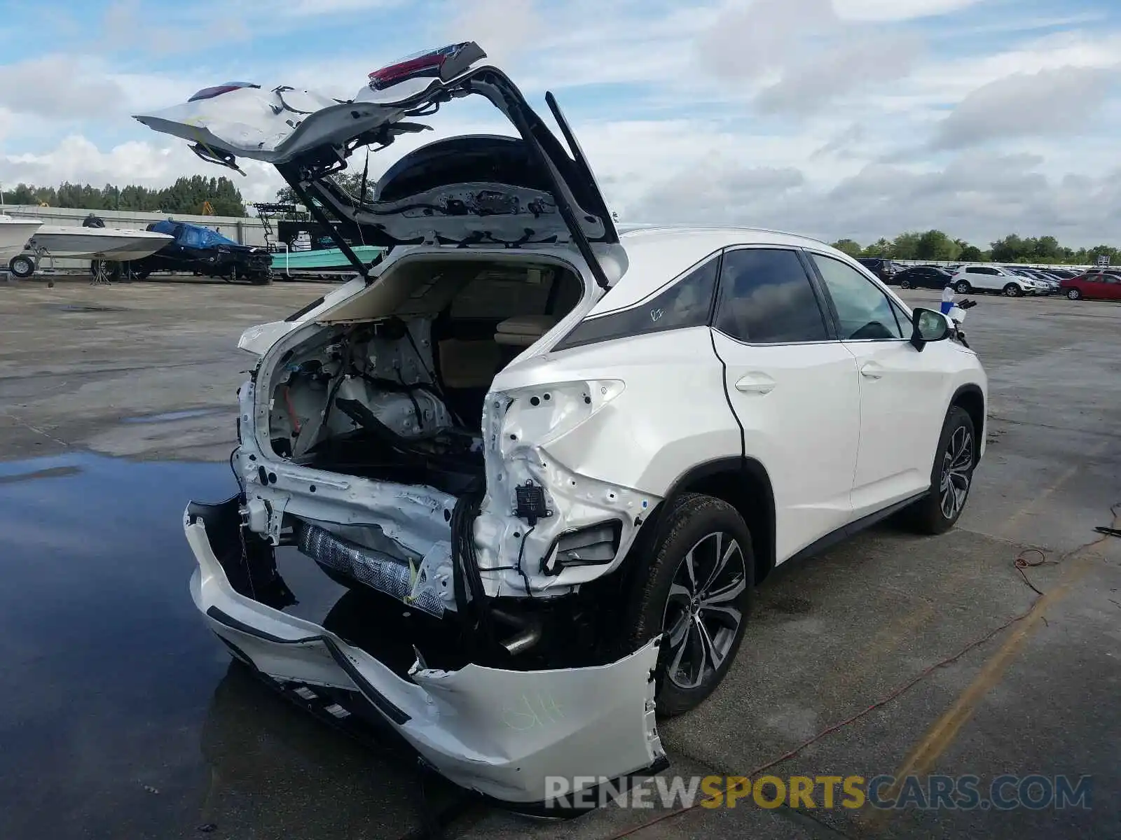 4 Photograph of a damaged car 2T2HZMAA2LC164847 LEXUS RX350 2020