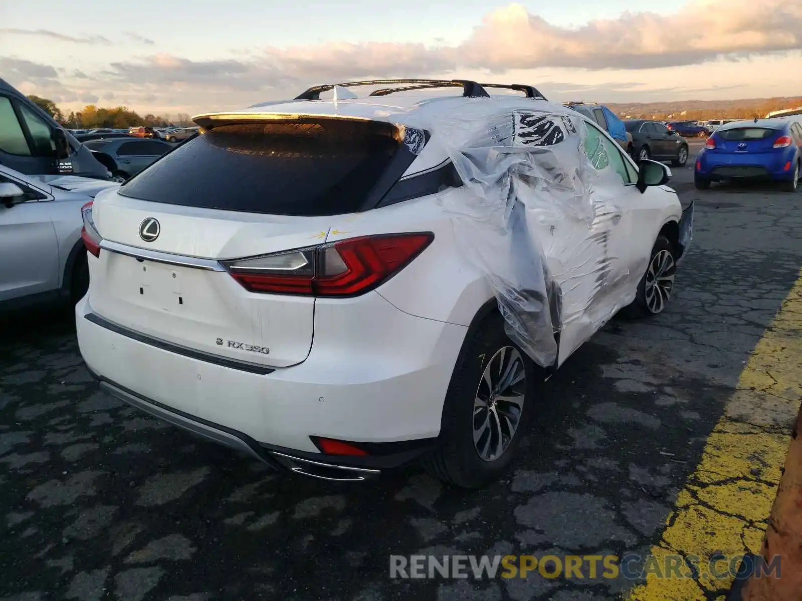 4 Photograph of a damaged car 2T2HZMDA3LC215686 LEXUS RX350 2020