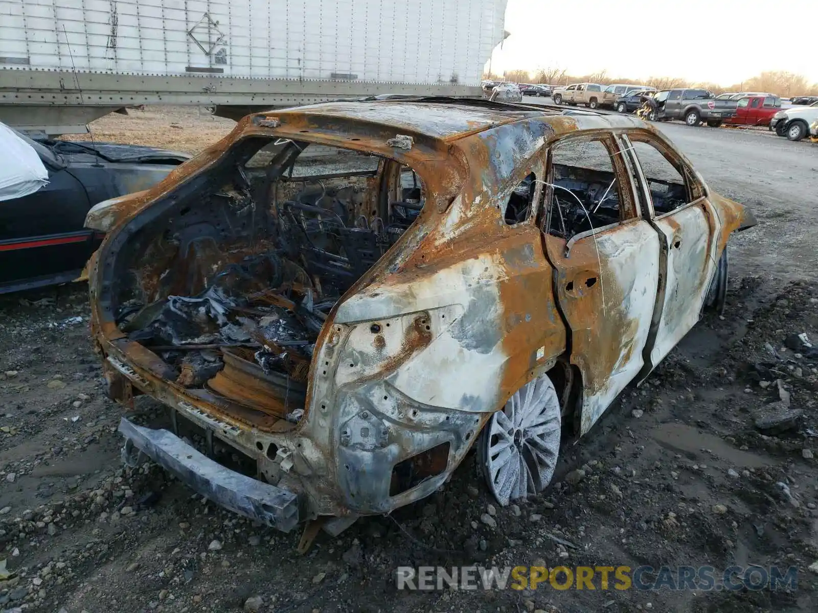 4 Photograph of a damaged car 2T2JZMDA4LC228156 LEXUS RX350 2020