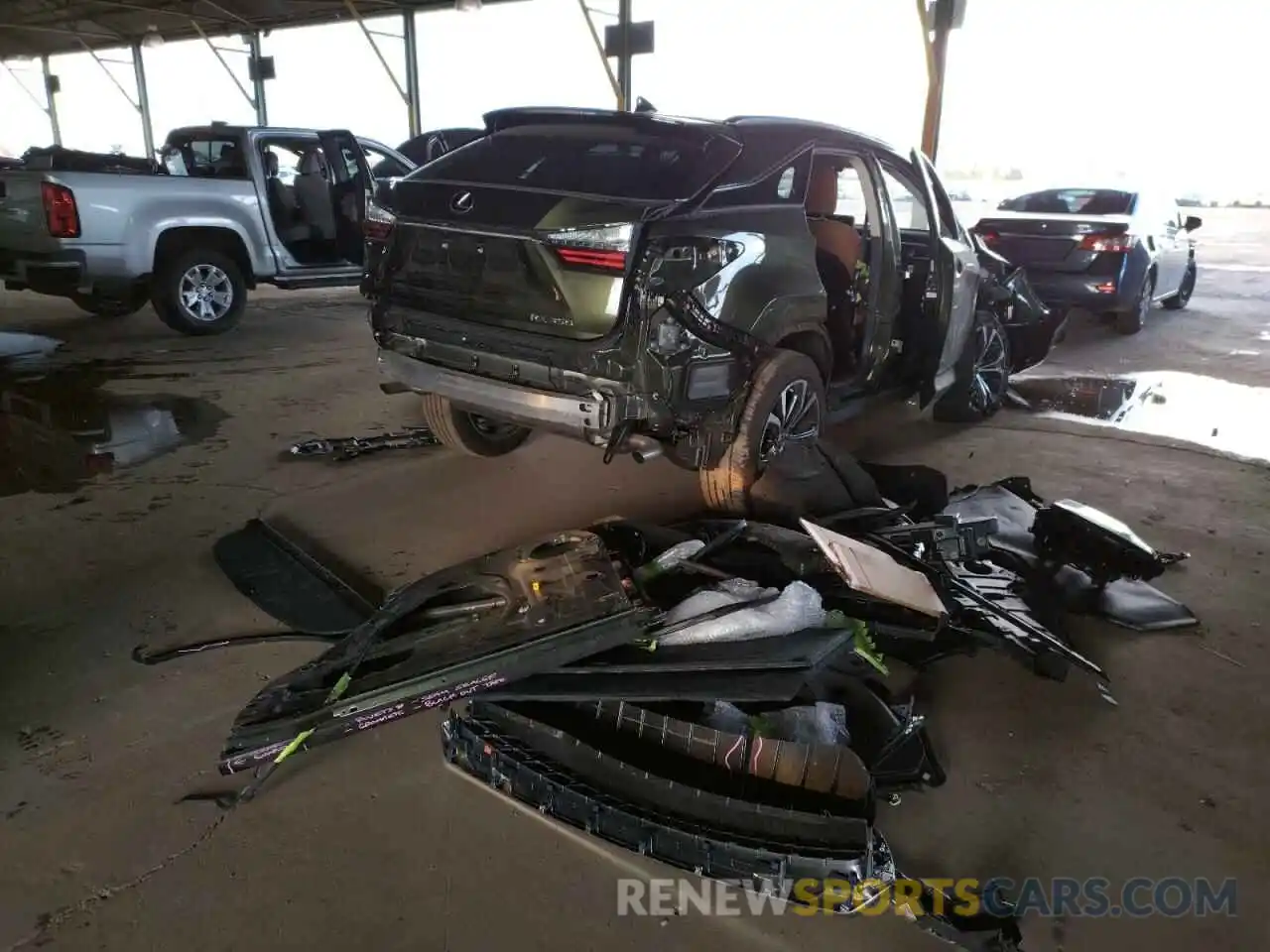 4 Photograph of a damaged car 2T2HZMAA0MC214677 LEXUS RX350 2021