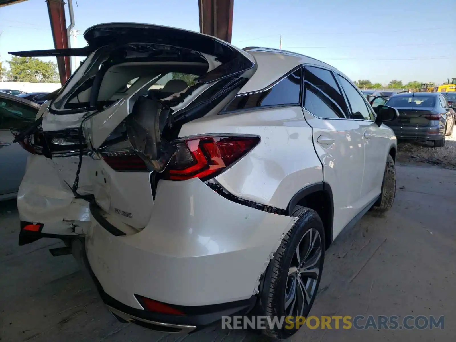 4 Photograph of a damaged car 2T2HZMDA6MC268108 LEXUS RX350 2021