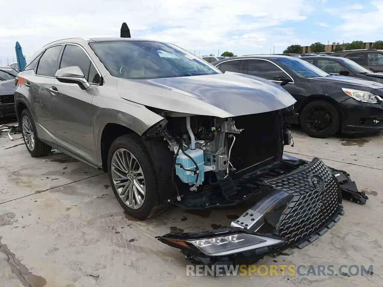 1 Photograph of a damaged car 2T2JZMAA8MC217845 LEXUS RX350 2021