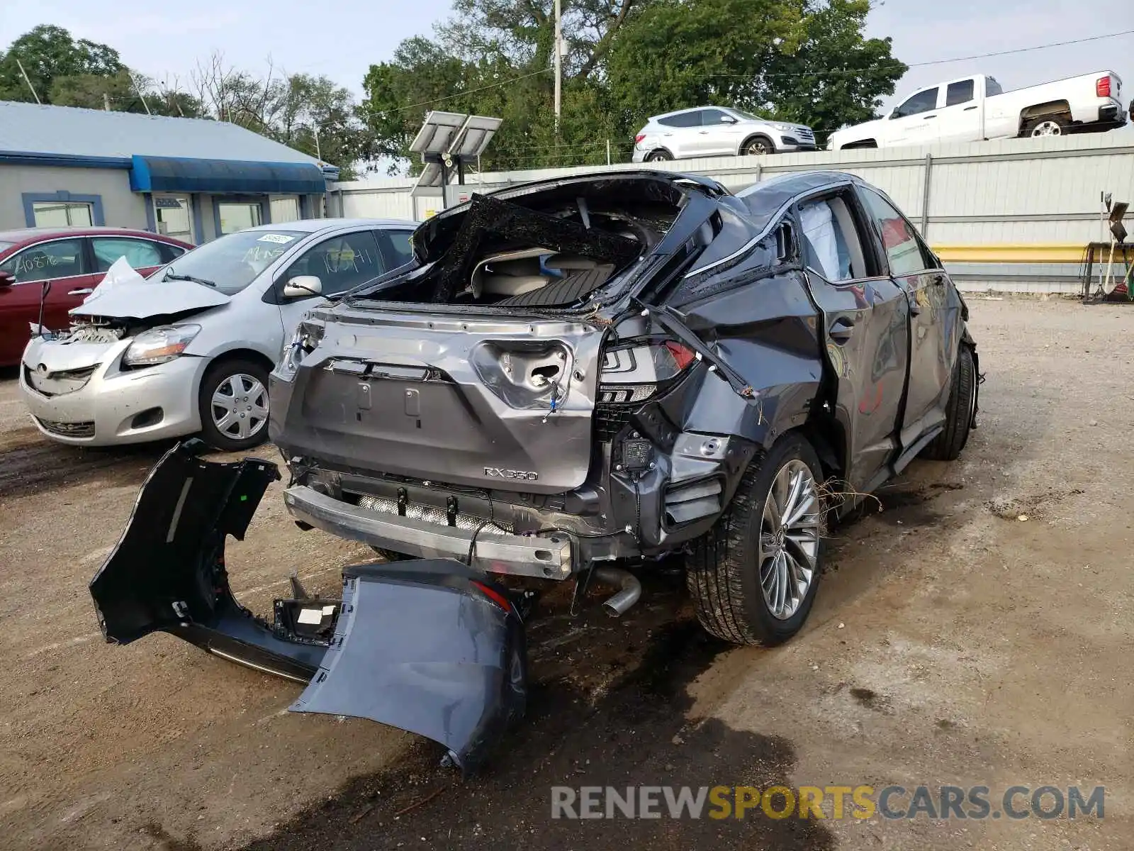 4 Photograph of a damaged car 2T2JZMDAXMC296544 LEXUS RX350 2021