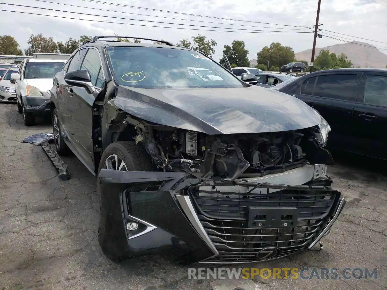 1 Photograph of a damaged car 2T2BGMCA1KC029804 LEXUS RX450 2019