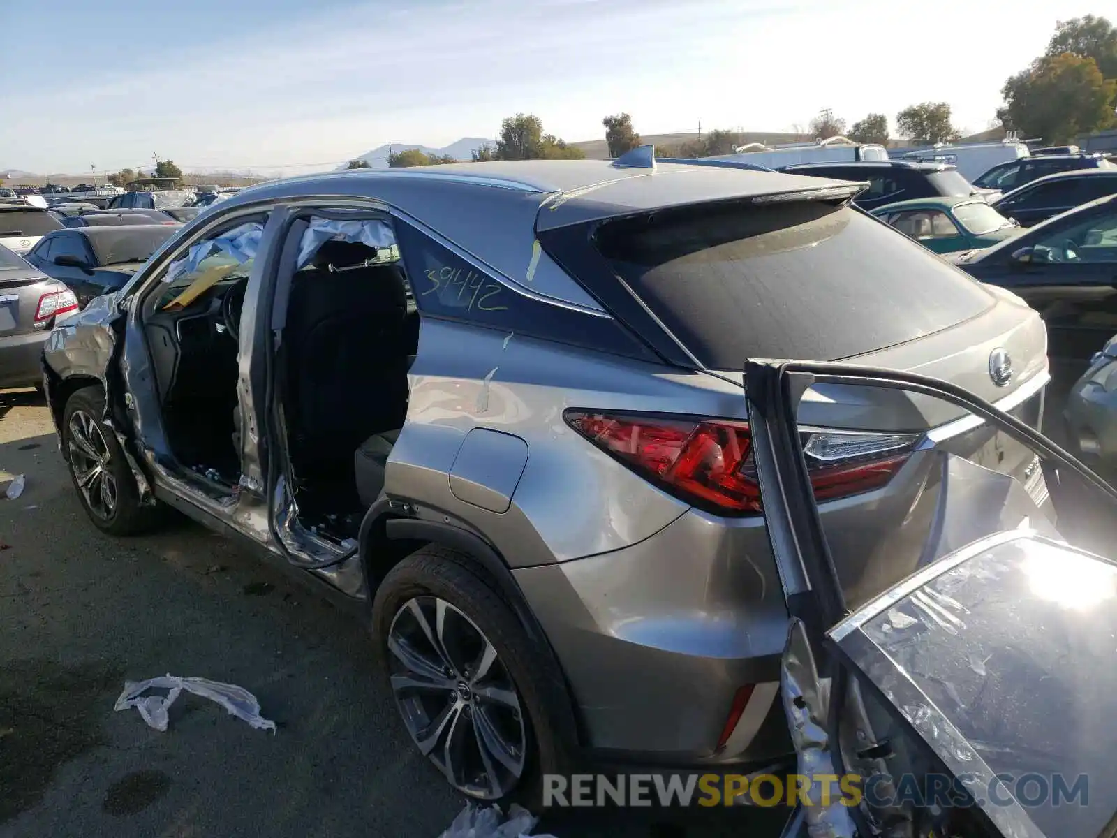 3 Photograph of a damaged car 2T2BGMCA2KC037703 LEXUS RX450 2019