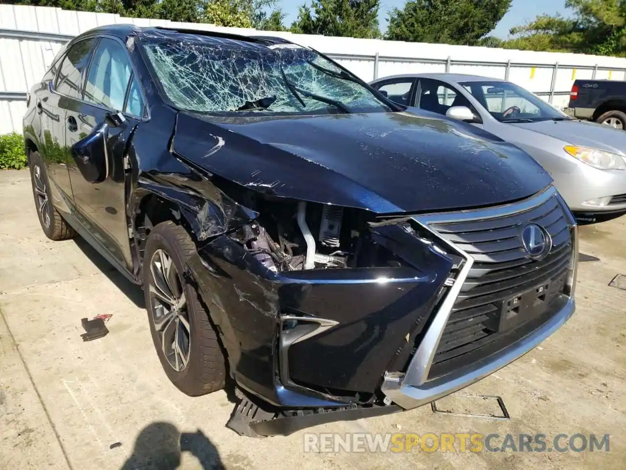 1 Photograph of a damaged car 2T2BGMCA5KC035539 LEXUS RX450 2019