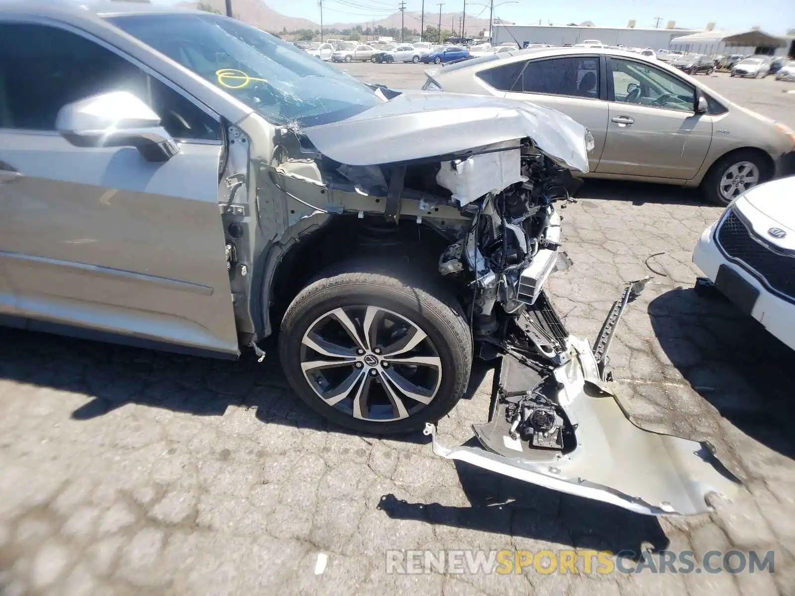 9 Photograph of a damaged car 2T2BGMCA6KC035324 LEXUS RX450 2019