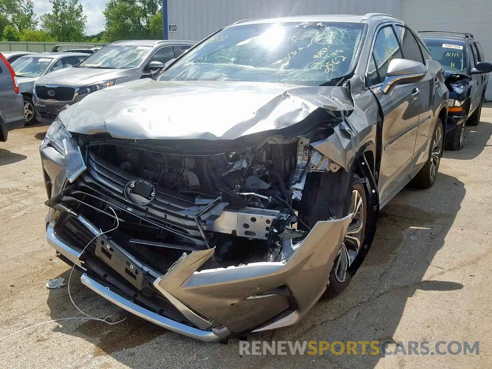 2 Photograph of a damaged car 2T2BGMCA7KC032562 LEXUS RX450 2019