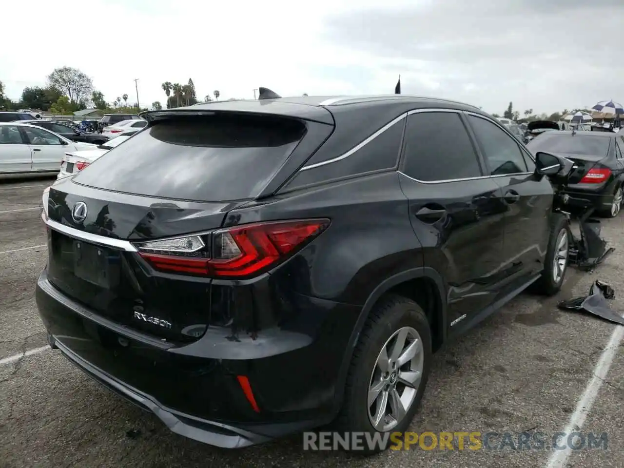 4 Photograph of a damaged car 2T2BGMCAXKC030045 LEXUS RX450 2019