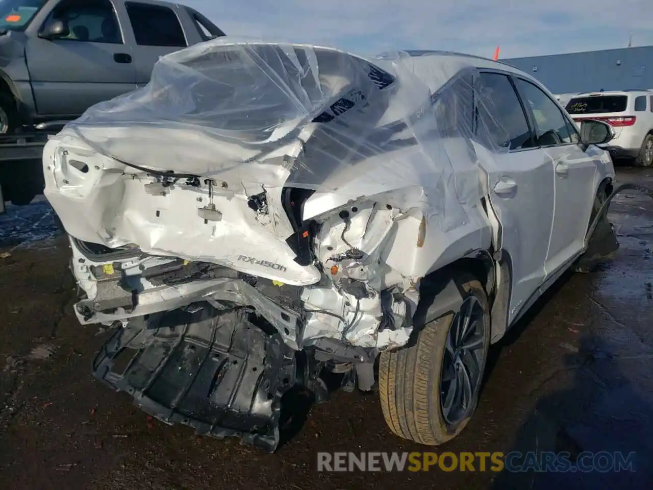 4 Photograph of a damaged car 2T2BGMCAXKC038744 LEXUS RX450 2019