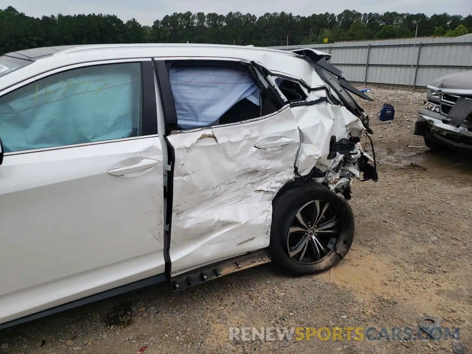 9 Photograph of a damaged car 2T2HGMDAXLC047678 LEXUS RX450 2020