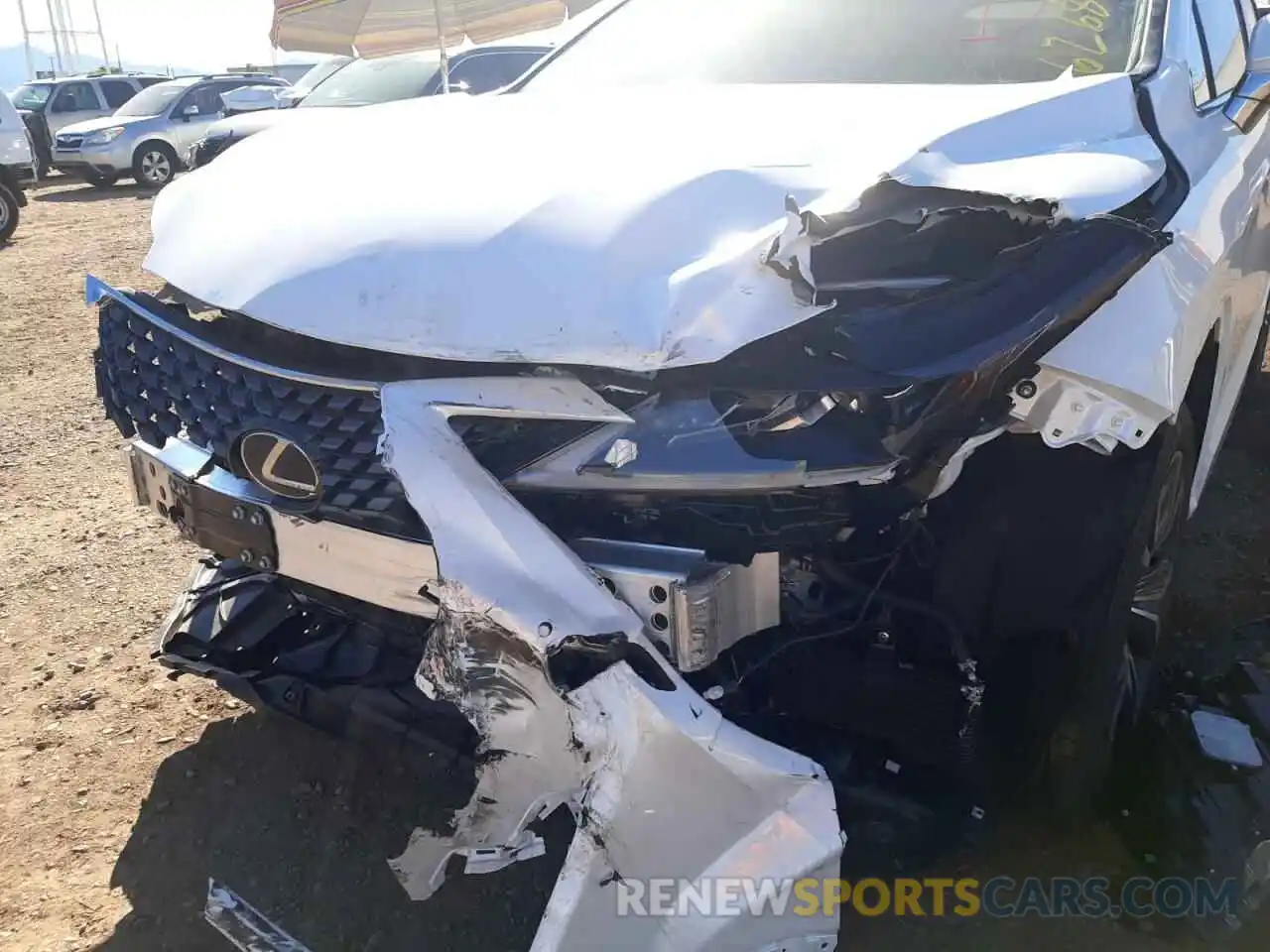 9 Photograph of a damaged car 2T2HGMDA9NC091447 LEXUS RX450 2022